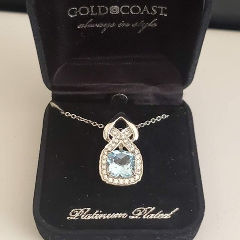 Gold Coast Platinum Plated Cushion Cut Faux Aquamarine Halo Pendant Necklace